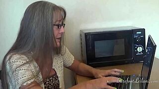 i dangle and tease in office with heels and pantyhose