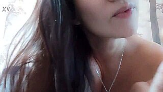 Look at her erect nipples as she fucks her pussy fast with artificial cock