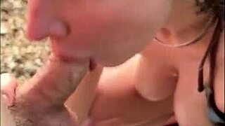 horny teen 18+ in bikini gives oily titjob and sucks my dick on public beach