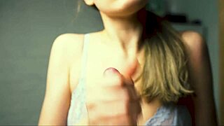 A Beauty With Red Lips Jerks Off Her Boyfriend In Close-Up And Brings Him To The Peak Of Pleasure