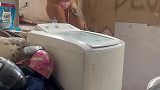 woman washes clothes freely with pussy and tits out