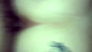 Couple engages in interracial doggystyle position during their encounter.