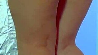 college desi with a sexy dress and sneakers playing with glass dildo