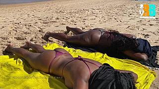 baiano filmmaker exhibits two women masturbating on beach in amateur adventure