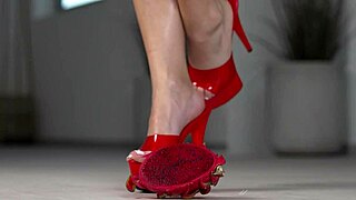 Foot fetish video crushing fruits.