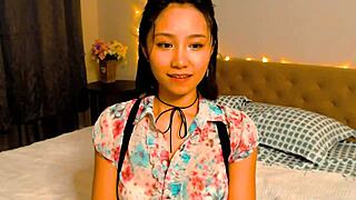 The casual story of this beautiful 18+ asian girl in cosplay fingering on webcam