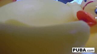 Sexy nadia takes a bath with some rubber duckies.