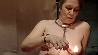 Hey, check out this slave girl's self-session with urine and candle play.
