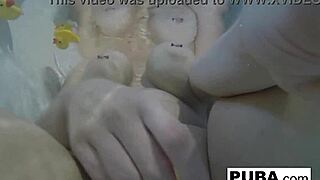 Sexy nadia takes a bath with some rubber duckies.
