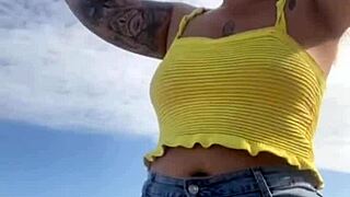 Young Woman Flashes Swollen Pussy in Tight Bikini on Beach