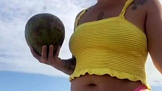 Young Woman Flashes Swollen Pussy in Tight Bikini on Beach