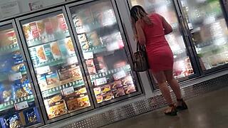 candid glimpse of ass under sundress hints at hidden curves and big tits