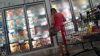 candid glimpse of ass under sundress hints at hidden curves and big tits