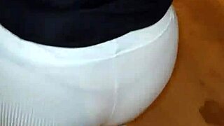 the venezuelan mature woman is on the street, perhaps shopping or walking, in a neutral story