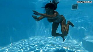 Beautiful big-breasted beauty Angelica Heart bathing in pool.