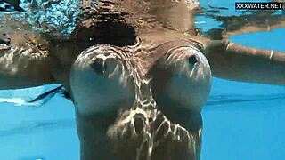 Beautiful big-breasted beauty Angelica Heart bathing in pool.