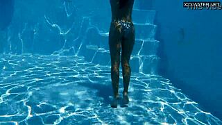 Beautiful big-breasted beauty Angelica Heart bathing in pool.