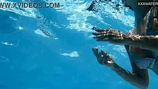 Beautiful big-breasted beauty Angelica Heart bathing in pool.