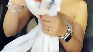 Amateur milf creates naughty content on public road from co-driver seat.