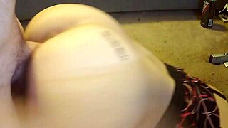 girlfriend kneels in front of the desk