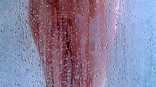 watch her big ass bounce in the shower as she bathes with her curves