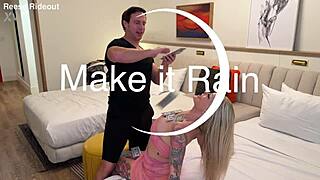 blonde tattooed girl dances in the rain making it pour down