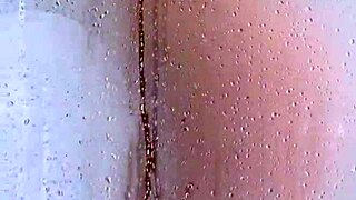 watch her big ass bounce in the shower as she bathes with her curves