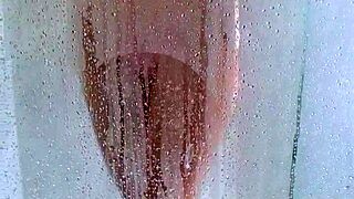 watch her big ass bounce in the shower as she bathes with her curves