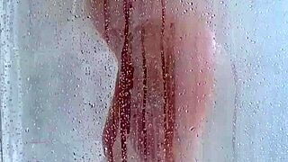 watch her big ass bounce in the shower as she bathes with her curves