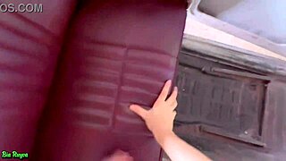 The redhead fucks the old cuckold in the car while the young man watches. The scene involves blowjob and pussy action.