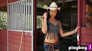 Ebony milf Briana Ashley poses her big ass on the ranch
