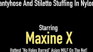 Pantyhosed Cambodian cougar Maxine X fucks her pussy with a heel in solo play.