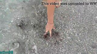 imagine masturbating with a stone shoved in ass and pussy right on a crowded nudist beach