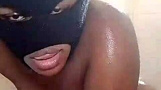 sexy ebony teen oils up in steamy shower showing off her curves