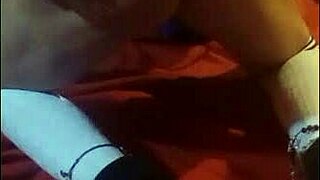 Stroking cock and using vibrator for anal on the floor.