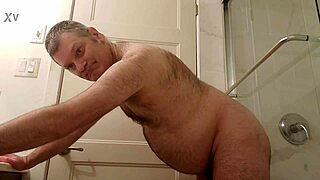 exhibitionist martin lavallee rams huge dildo up his ass in bathroom mirror