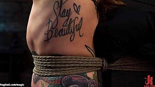 BEAUTIFUL TATTOOED SLAVE GETS WHIPPED AND BOUND HARD!