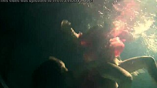 Lilia Mihalkova and Natalia Kupalka dive underwater for steamy teen lesbian pool play
