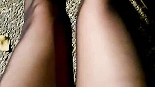chinese ladyboy in stockings flashes legs outdoors then jerks to cumshot