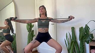 Inked Girl Builds Strength with Rubber Band Workout Warm-Up in SFW Yoga Fitness