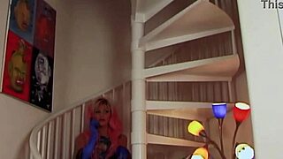 Brittany Andrews pegs pink-haired Vanessa Lane bent over with strapon