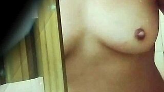 Sneaking Upskirt Views of Sexy Colombian Teacher's Natural Tits on School Trip Bathroom