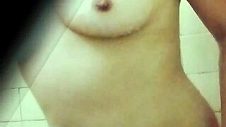 Sneaking Upskirt Views of Sexy Colombian Teacher's Natural Tits on School Trip Bathroom