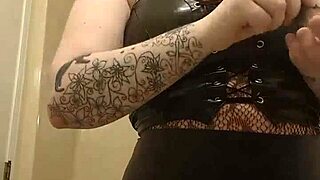 Chubby tattooed babe slips lovesense toy in while doing her makeup teasingly