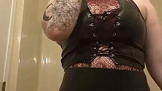 Chubby tattooed babe slips lovesense toy in while doing her makeup teasingly