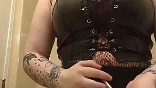 Chubby tattooed babe slips lovesense toy in while doing her makeup teasingly