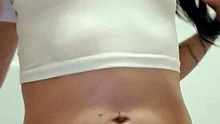 Emy Angel's soaked t-shirt clings to her teasing curves
