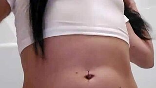 Emy Angel's soaked t-shirt clings to her teasing curves