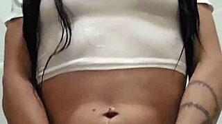 Emy Angel's soaked t-shirt clings to her teasing curves