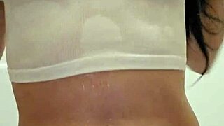 Emy Angel's soaked t-shirt clings to her teasing curves